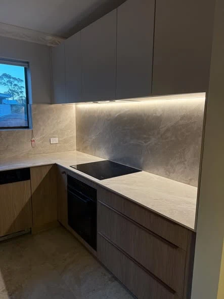 LED strip lighting installed under kitchen cabinetry