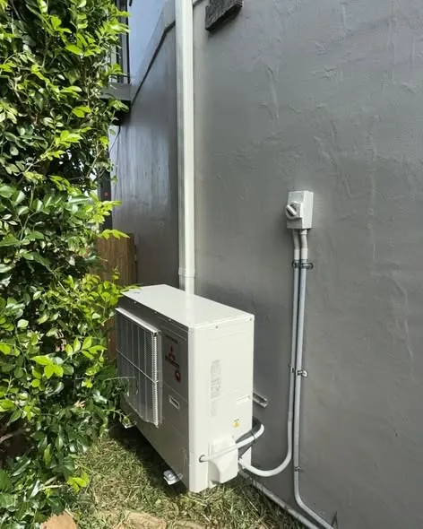 Outdoor unit and conduit run